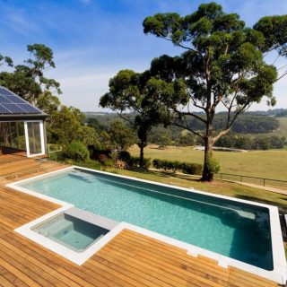 Achieve a similar effect with your pool design if you have a sloping site
